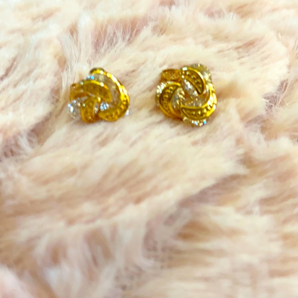 Beautiful gold plated knot earrings. Not stamped